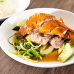 Entenbraten mit Gemüse auf einem Teller